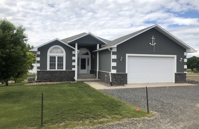 Just steps to the beach. Lakefront Property with Endless Views.