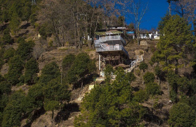 Kaath Maati-Luxurious woodem two storied Treehouse in the lap of nature