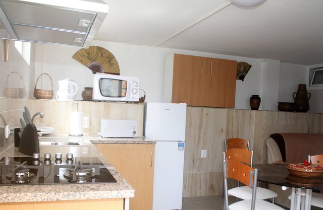 KITCHENETTE-``O NINHO`` (-COMODITY AND WELL-BEING-)