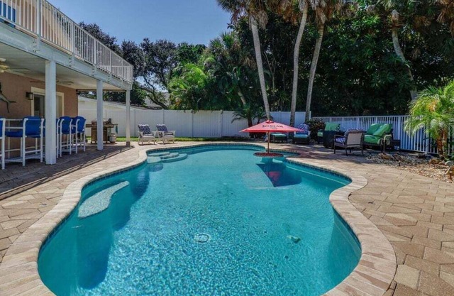 Lagoon-Side 4BR Home w/Pool, Hot Tub & More