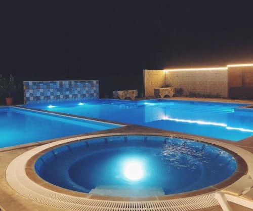 Laguna House next to Pool at Bazaleti Lake