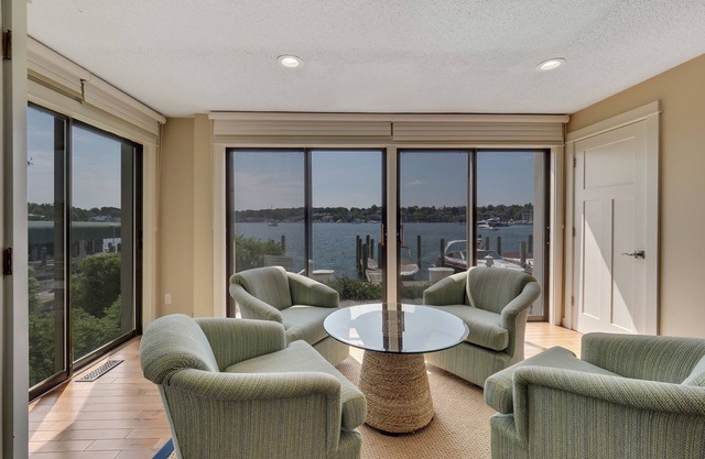 Lake Charlevoix Views | Private Balcony | Pool, Hot Tub, Sauna | Sleeps 4