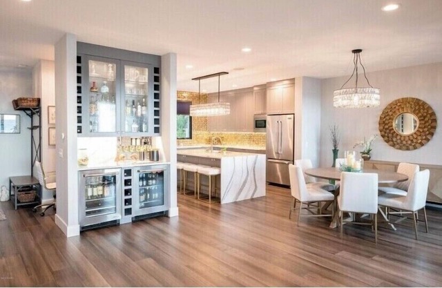 Lake Michigan home with beautiful beach frontage accessible from back yard.