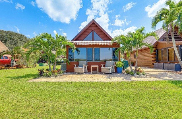 Lake Okeechobee Log Cabin w/Community Pool & Dock