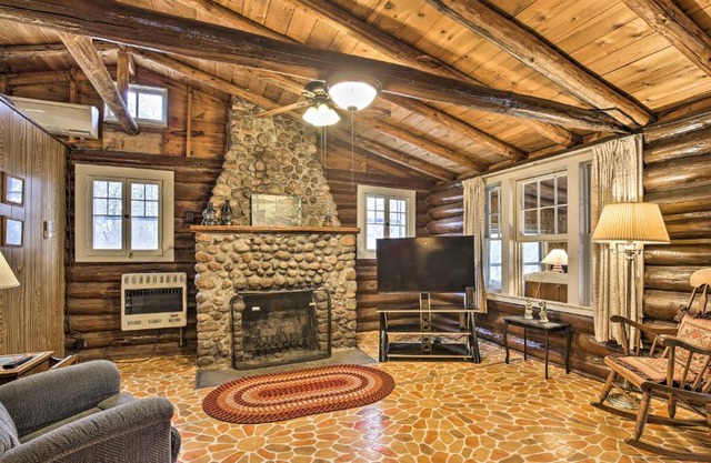 Lakefront 1930s Log Cabin with Dock and Fire Pit!