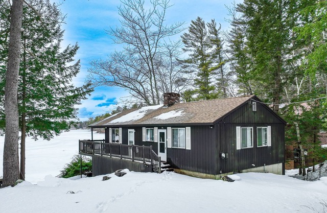 Lakefront cabin with private beach, dock, deck, & fireplace - great sunsets