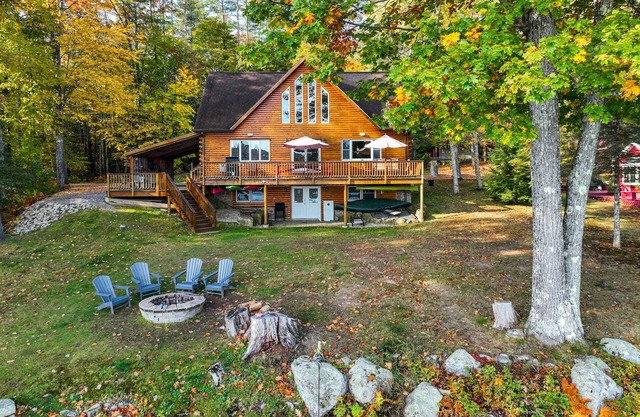 Lakefront, dog-friendly home with dock, kayaks, SUPs, canoe, huge deck & firepit
