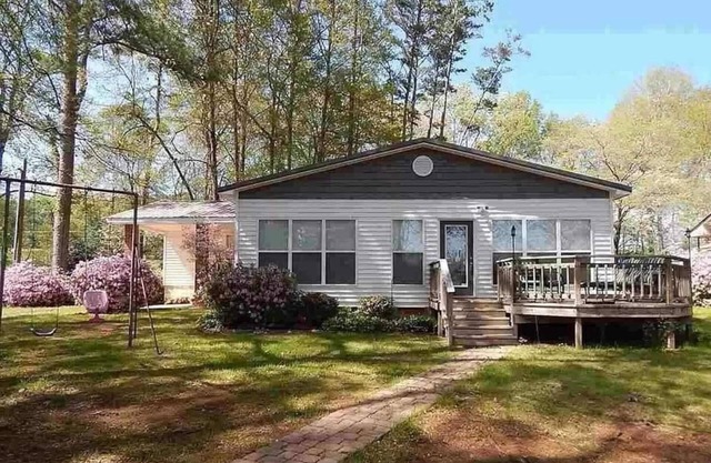 Lakefront home- 3 slip boathouse-Large yard