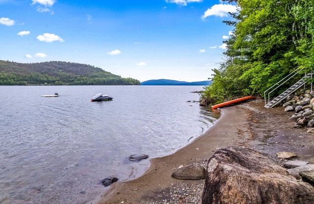 Lakefront home on beautiful Schroon Lake with private beach & dock- dog-friendly