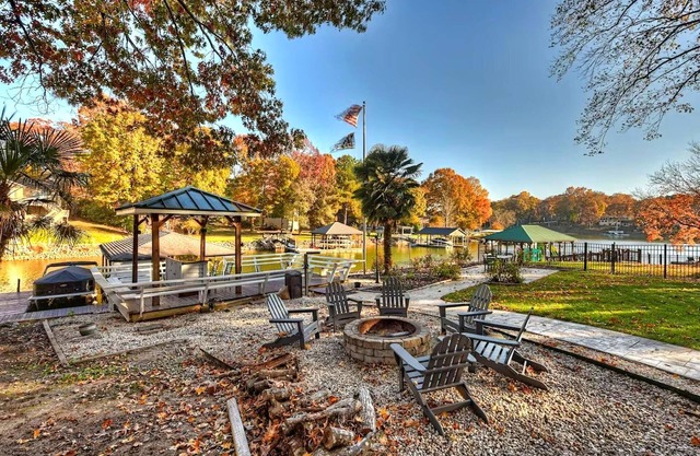 Lakefront Home | Private Dock, Tiki Bar, Firepit | Shore to Please by AvantStay