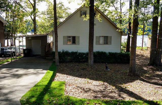 lakefront home with kayaks in gated lake community in Macon Georgia