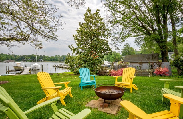 Lakefront home with private dock, deck, hot tub, firepit, Ping-Pong, large yard