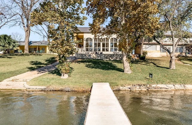 Lakefront home with patio, grill, lake views, office, lake access & washer/dryer