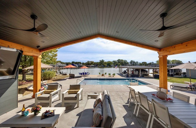 Lakefront Luxury: Sunrise Views, Pool, Dock & Walk to Dining!