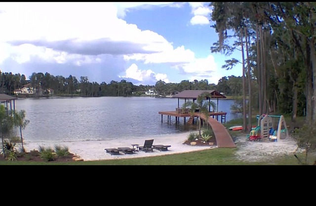Lakefront Oasis. Sandy Beach and dock await your relaxation!