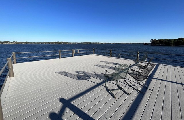 Lakefront on open water w/fire pit, boat dock/party deck, paddle boards & kayak