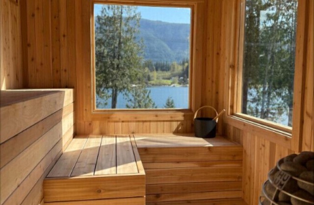 Lakefront Retreat with a Sauna, Hot Tub & Private Beach Access