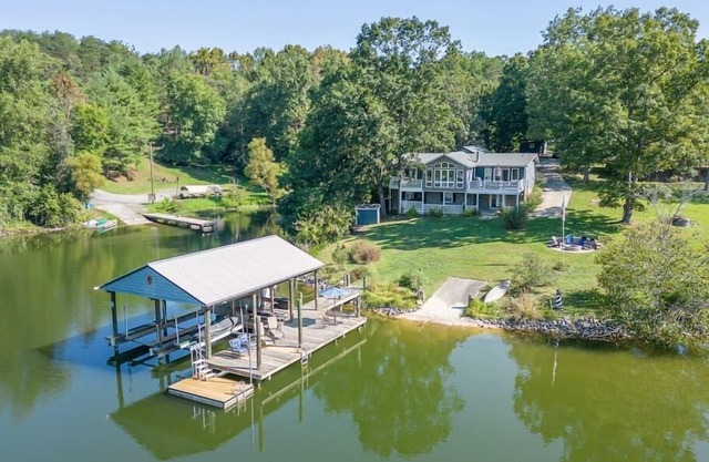 Lakefront Retreat with Game Room, Hot Tub, and Gym!