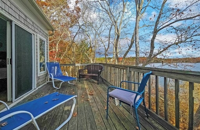 Lakefront Stunning Cape Cod Views w Private Lake Beach Acre+ Land on the lake