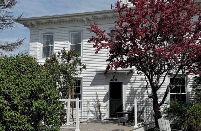 Lakeside Lodging, Elevated - Walk to Village shops and restaurants and enjoy a private lakefront, newly renovated and furnished 1843 home!