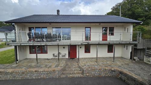 Large house with sauna, playground and close to the beach in Svanesund