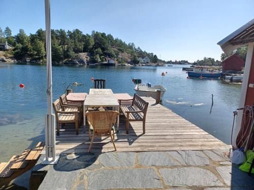 Large house with sea arch, beach and jetty