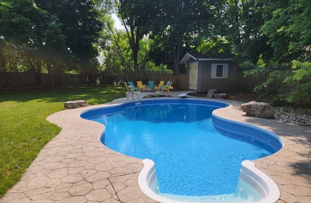 Large suite with king bed, pool, and parking!