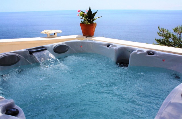 Large villa with outdoor jacuzzi over the sea