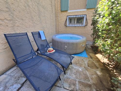 Le jardinet d'Emma - Appart RDC avec jacuzzi, parking, au calme