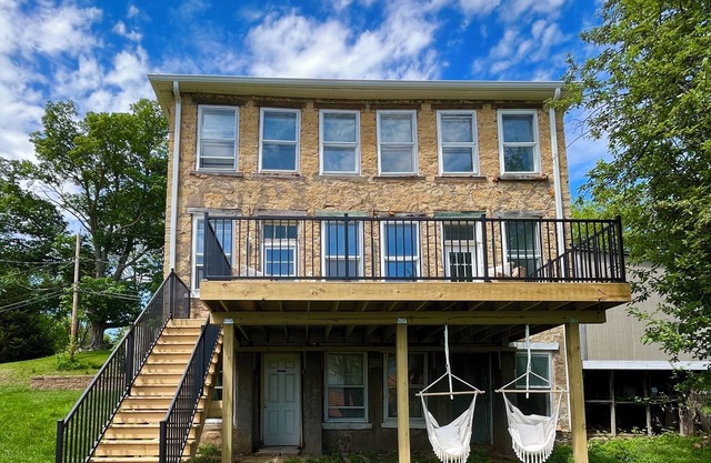 LeClaire historic stone house with modern updates, river views and large yard