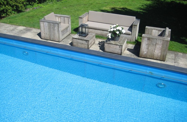 Living in a renovated 1907 town house with garden and pool