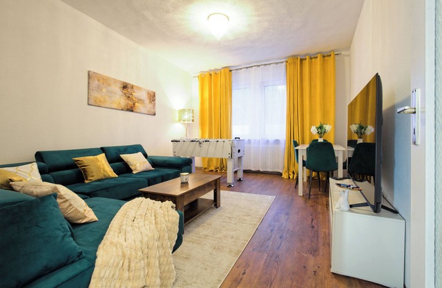 Living La Christal apartment with workspace & games