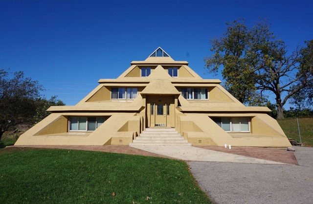 Locally Known as The Pyramid House w/5,000 Sq Ft of Living Space 6 BRs & 3 Baths