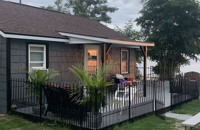 Location, location,!! Step out of your cottage right to the sandy beach!