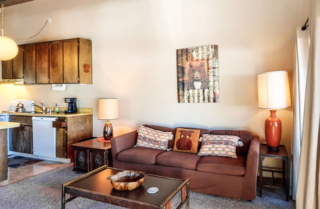 Lofty Condo with Balcony, Partial Lake Views, Shared Pool, Tennis and Sauna