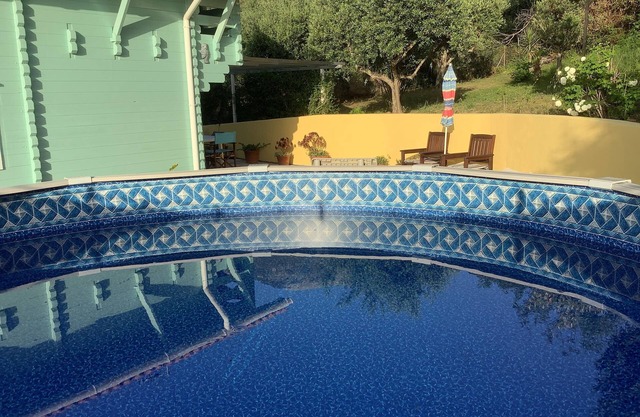 Log Cabin Among Olive Groves In A Rural Setting
