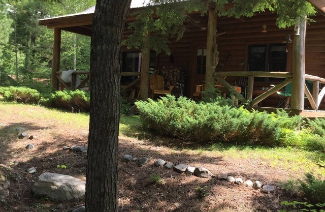 Log Cabin On Quiet Wilderness Lake In Downeast Lakes Region Of Maine