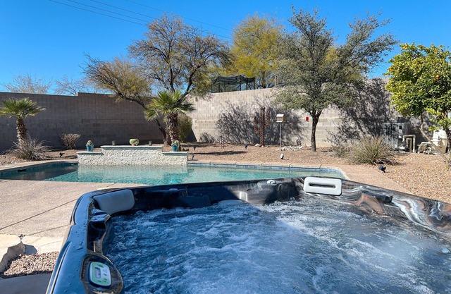 Lovely desert home with pool, covered patio, office, & mtn views - dog-friendly