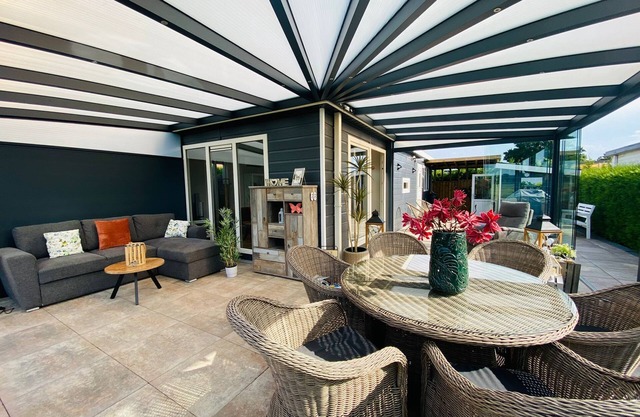 LuxChalet vacation home ELLA view on Ijssel in vacation park Pool Strand Holland