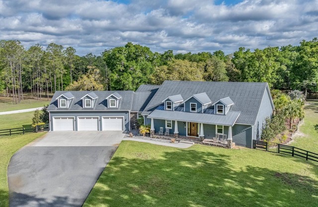 Luxurious 6-bedroom estate with pool, on over 6 fenced in acres