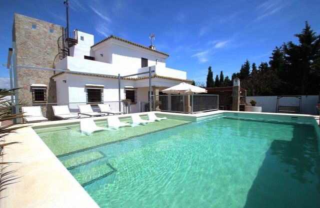 luxurious villa in quiet surrounding for 6 guests with large pool and precious terraces and nice bbq-area and seaview in the distance