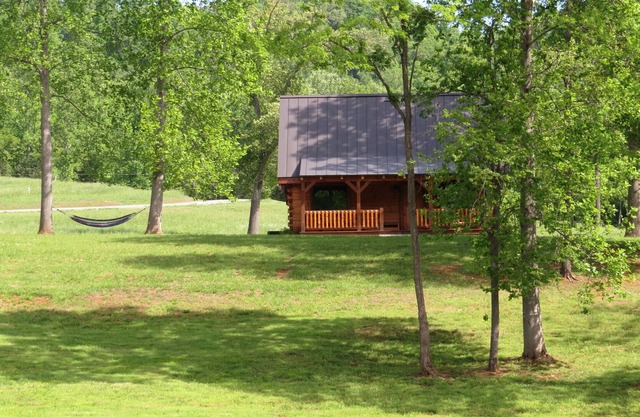 Luxurious Log Cabin On 200 Acres Overlooking Private Lake.