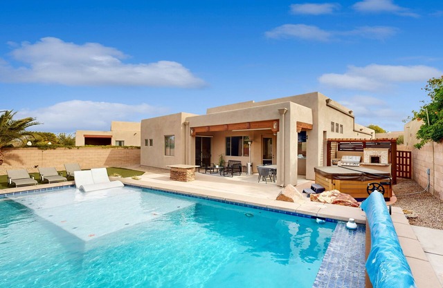 Luxurious mountain view home with gorgeous pool, hot tub, grill, patio, & AC