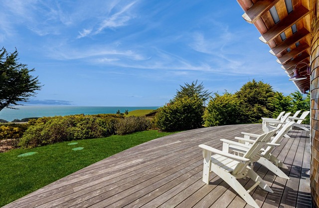 Luxurious, new coastal home w/modern kitchen, sweeping ocean and pastoral views