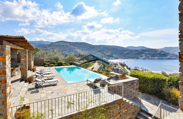 Luxurious villa in Vourkari with a swimming pool, sea and sunset view.
