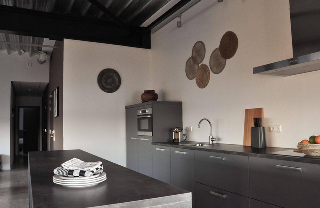 Luxury apartment on the first floor with a private terrace and waterfront view.