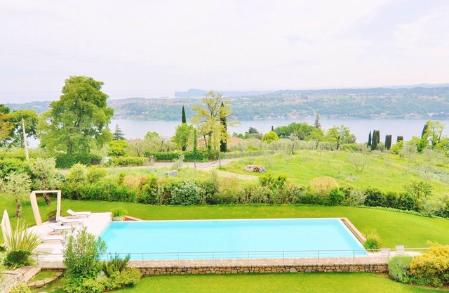 Luxury apartment within prestine and quiet enviroment with pool and lake view