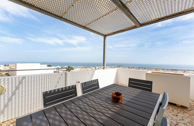 Luxury Duplex Apartment with Sea Views, Shared Pool and Air Conditioning