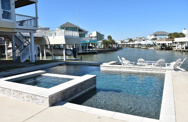 Luxury Galveston Waterfront Escape – Amazing Pool, Spa & Canal Views!