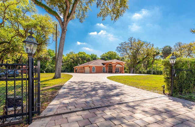 Luxury Gated Home with Mini Golf